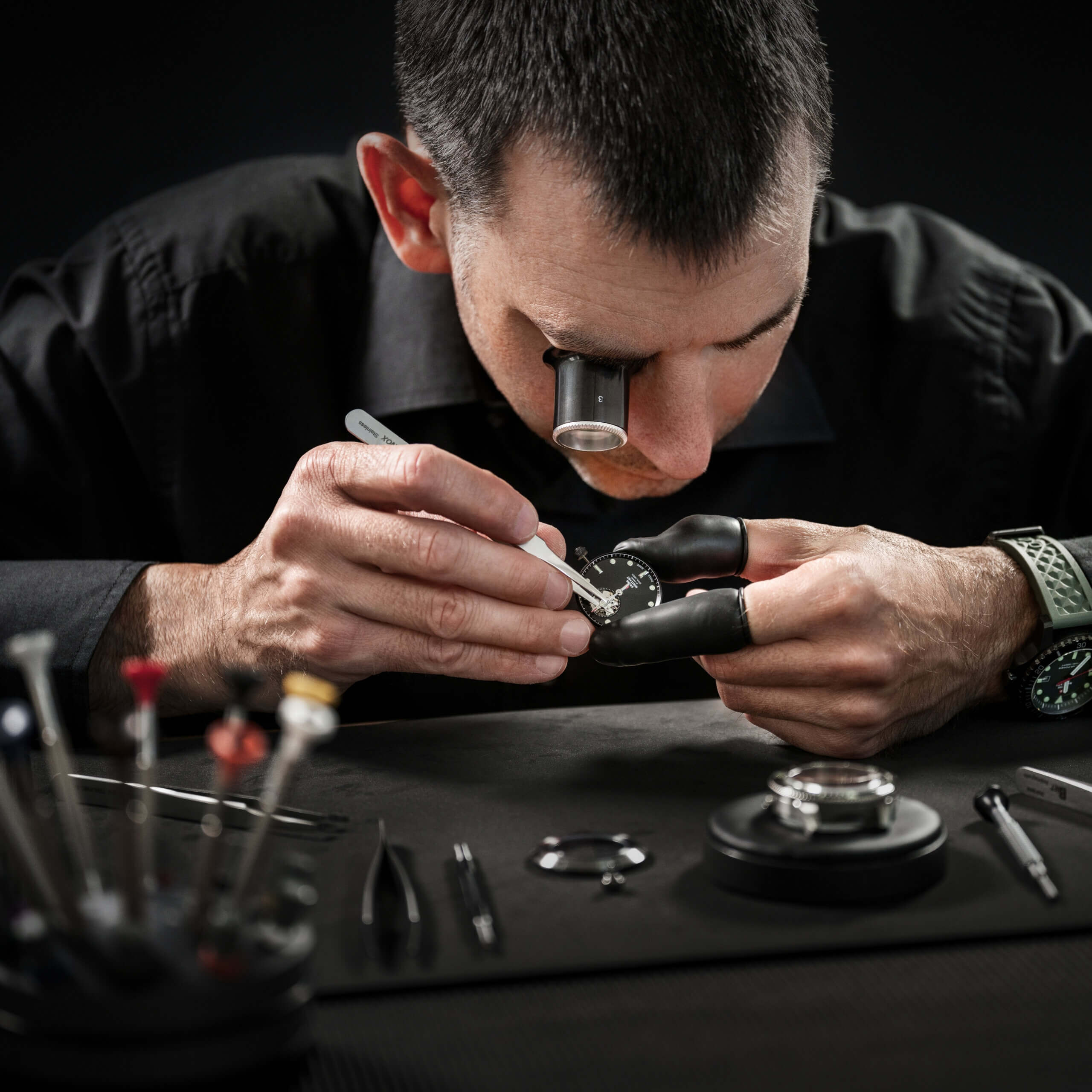 Swiss Military by Chrono watchmaker assembling a watch movement – hand‑crafted Swiss Military timepiece made in Switzerland